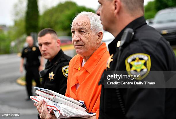 Jerry Sandusky enters the Centre County Courthouse for a hearing on May 2, 2016 in Bellefonte, Pa. The U.S. Department of Education is levying the...