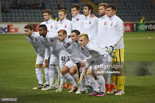 Players of FC Zorya Luhansk pose for a group photo prior to the UEFA Europa League group A match between FC Zorya Luhansk and Feyenoord at...