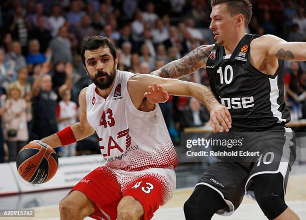 Daniel Theis, #10 of Brose Bamberg competes with Krunoslav Simon, #43 of EA7 Emporio Armani Milan in action during the 2016/2017 Turkish Airlines...