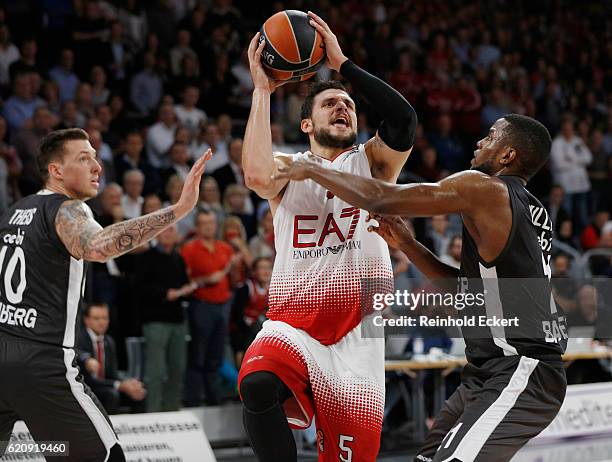 Alessandro Gentile, #5 of EA7 Emporio Armani Milan competes with Darius Miller, #21 of Brose Bamberg during the 2016/2017 Turkish Airlines EuroLeague...