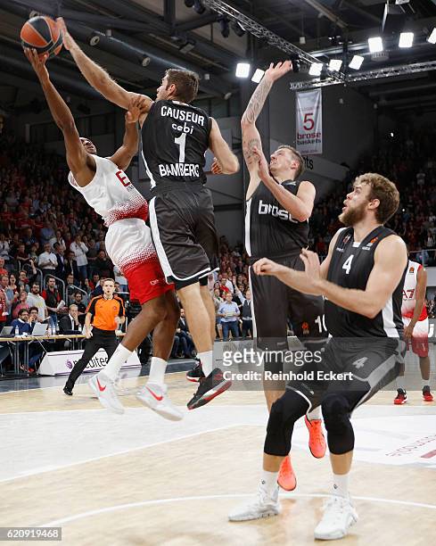 Ricky Hickman, #7 of EA7 Emporio Armani Milan competes with Fabien Causeur, #1 of Brose Bamberg during the 2016/2017 Turkish Airlines EuroLeague...