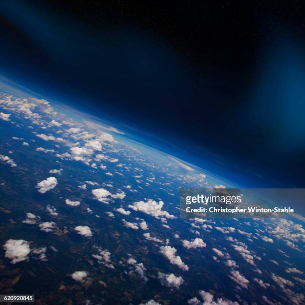 earth atmosphere viewed from space - orbiting earth stock pictures, royalty-free photos & images