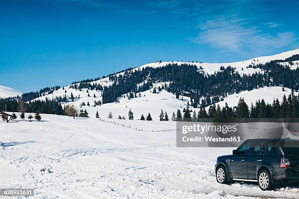 bulgaria, pirin mountains, offroad car during winter in the mountains, snowy field - pirin mountains stock pictures, royalty-free photos & images