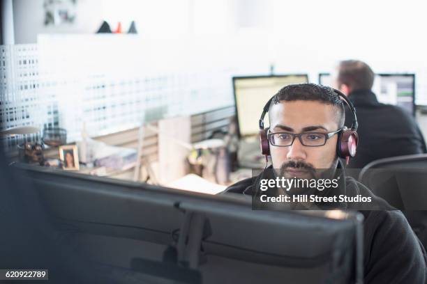 businessman working in office - cubicle work stock-fotos und bilder