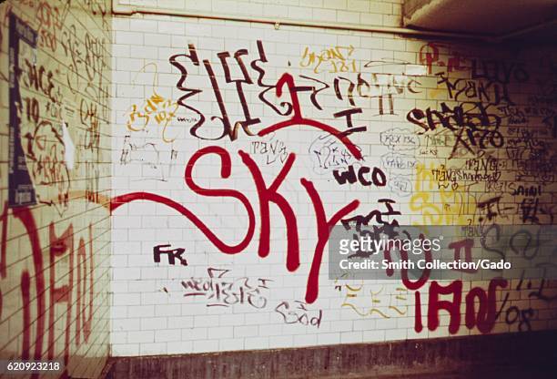Wall of the 116th Street subway station in East Harlem, New York City, New York with extensive graffiti, May, 1973. Image courtesy National Archives....