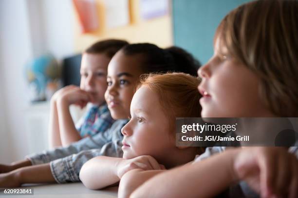 students listening in classroom - group people thinking stock pictures, royalty-free photos & images