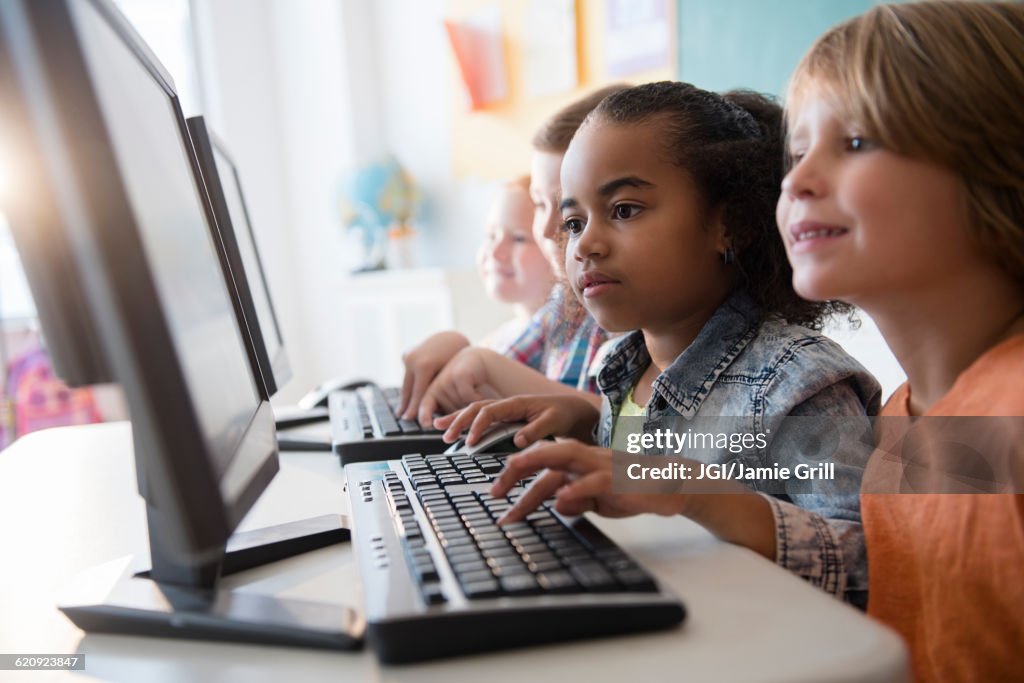 Students using computers in classroom