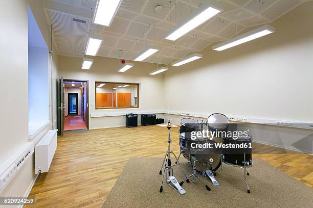 estonia, tartu, heino eller's music school, empty classroom with drums - acoustic music stock pictures, royalty-free photos & images