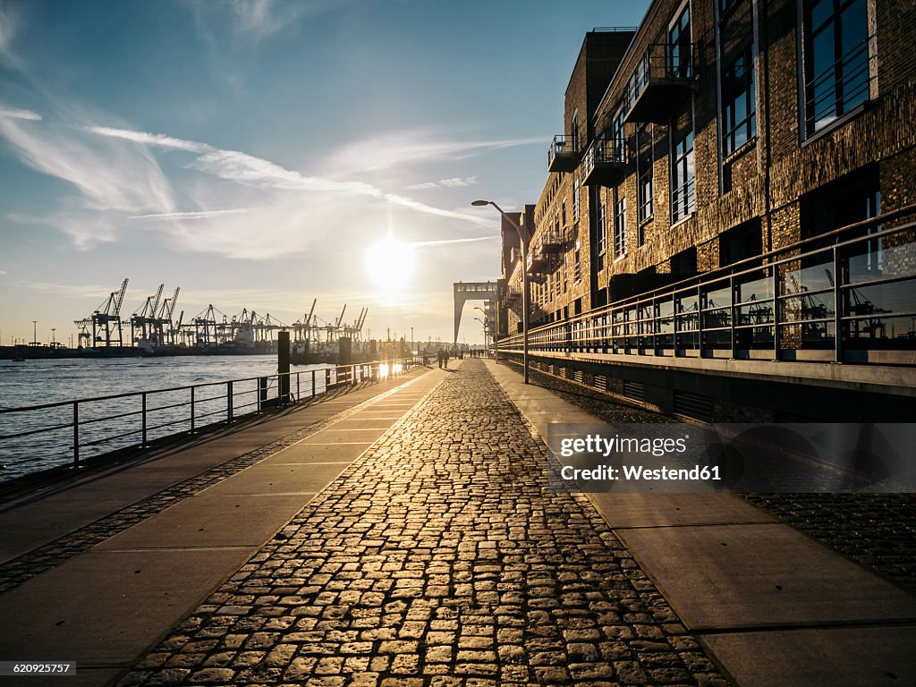 Germany, Hamburg, Sunset on harbour