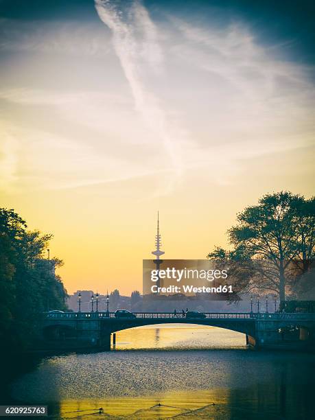 germany, hamburg, heinrich-hertz tower at sunset, outer alster lake - heinrich hertz stock pictures, royalty-free photos & images