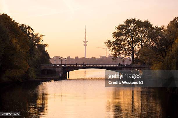 germany, hamburg, heinrich-hertz tower at sunset, outer alster lake - heinrich hertz stock pictures, royalty-free photos & images
