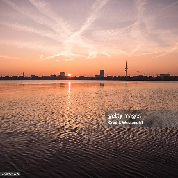 germany, hamburg, outer alster lake at sunset - alster lake stock pictures, royalty-free photos & images