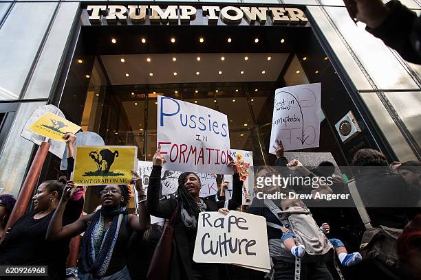Group of protestors, comprised mostly of women, rally against Republican presidential candidate Donald Trump outside of Trump Tower, November 3, 2016...