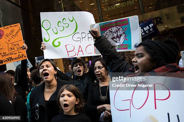 Group of protestors, comprised mostly of women, rally against Republican presidential candidate Donald Trump outside of Trump Tower, November 3, 2016...