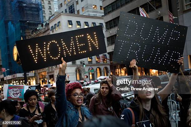 Group of protestors, comprised mostly of women, rally against Republican presidential candidate Donald Trump outside of Trump Tower, November 3, 2016...