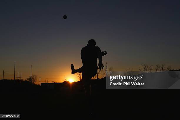 Jordie Barrett of the New Zealand All Blacks kicks at goal as the sun sets during a training session at Toyota Park on November 3, 2016 in Chicago,...