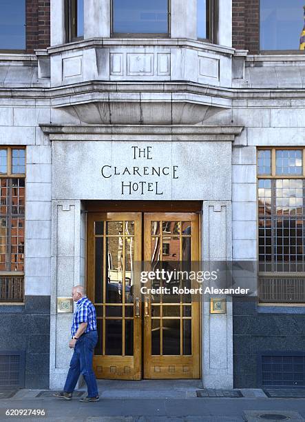 September 5, 2016: A man walks past the entrance to The Clarence Hotel in Dublin, Ireland. First opened in 1852, the hotel was purchased in 1992 by...