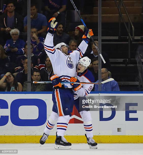 Patrick Maroon of the Edmonton Oilers scores at 10:28 of the second period against the New York Rangers and is grabbed by Jesse Puljujarvi at Madison...