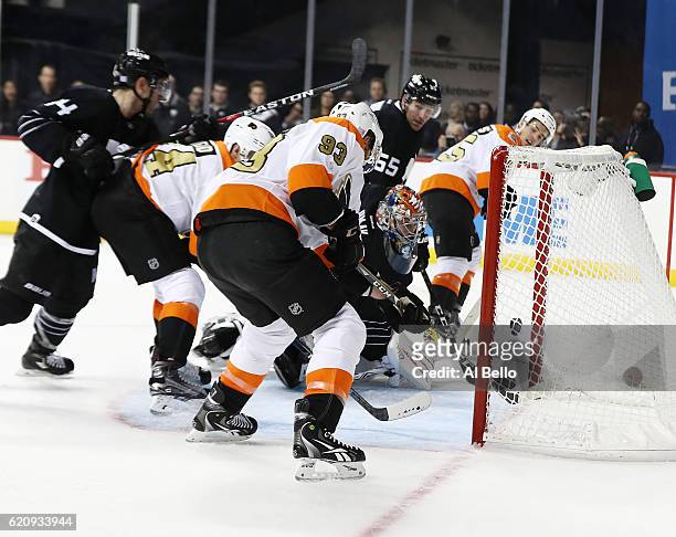 Jakub Voracek of the Philadelphia Flyers scores against Jaroslav Halak of the New York Islanders in the third period during their game at the...