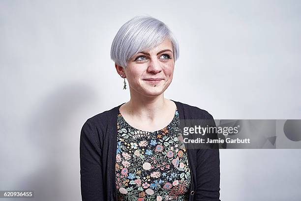 studio portrait of a early 20's female - grey blouse stock pictures, royalty-free photos & images