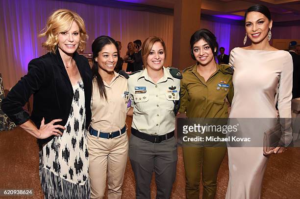 Actresses Julie Bowen and Moran Atias pose with soldiers of the Israel Defense Forces during the Friends Of The Israel Defense Forces Western Region...