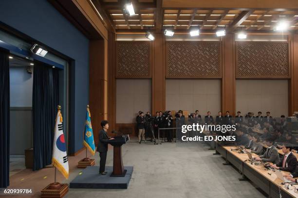South Korea's President Park Geun-Hye speaks during an address to the nation at the presidential Blue House in Seoul on November 4, 2016. Park on...