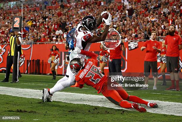 Wide receiver Julio Jones of the Atlanta Falcons keeps his feet in the end zone in front of cornerback Vernon Hargreaves of the Tampa Bay Buccaneers...