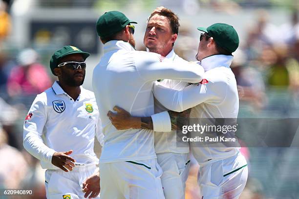 Dale Steyn of South Africa celebrates the wicket of David Warner of Australia during day two of the First Test match between Australia and South...