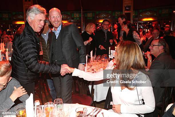 Carlo Ancelotti, soccer head coach of FC Bayern Munich and Matthias Sammer and his wife Karin Sammer during the VIP premiere of Schubeck's Teatro at...