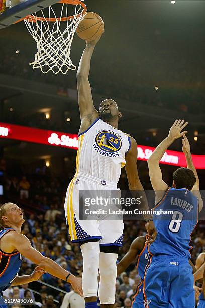 Kevin Durant of the Golden State Warriors dunks the ball against the Oklahoma City Thunder at ORACLE Arena on November 3, 2016 in Oakland,...
