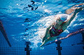 Underwater shot of swimmer training in the pool