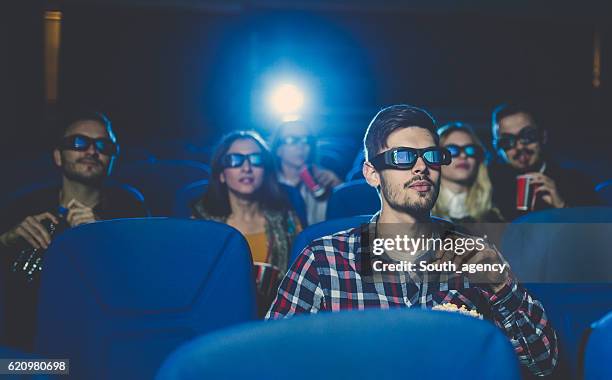 friends at the cinema - loving 2016 film stock pictures, royalty-free photos & images