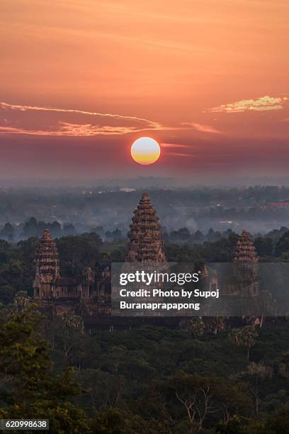 orange sunrise at angkor wat , siem reap , cambodia - angkor stock pictures, royalty-free photos & images