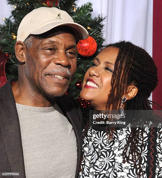 Actor Danny Glover and wife Elaine Cavalleiro attend the premiere of Universal's 'Almost Christmas' at Regency Village Theatre on November 3, 2016 in...