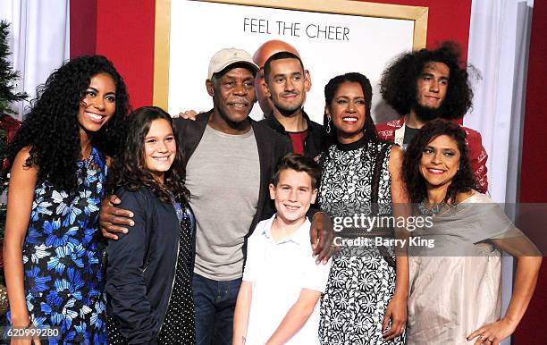 Actor Danny Glover and wife Elaine Cavalleiro and family attend the premiere of Universal's 'Almost Christmas' at Regency Village Theatre on November...