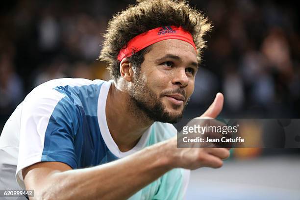 Jo-Wilfried Tsonga of France celebrates his third round victory against Kei Nishikori of Japan on day 4 of the BNP Paribas Masters 1000 of Paris at...