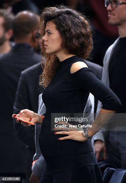 Noura El Shwekh, pregnant with Jo-Wilfried Tsonga of France attends his second round victory against Albert Ramos-Vinolas of Spain during the BNP...