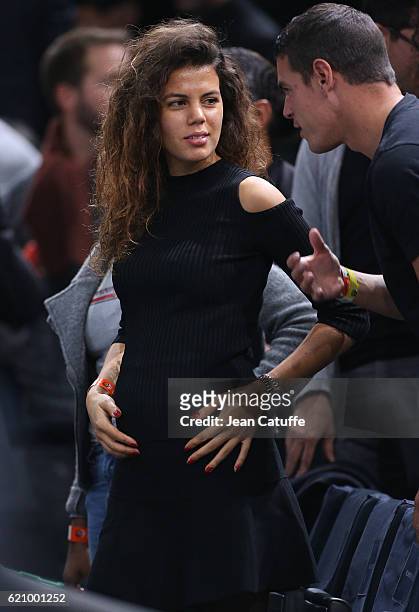 Noura El Shwekh, pregnant with Jo-Wilfried Tsonga of France attends his second round victory against Albert Ramos-Vinolas of Spain during the BNP...