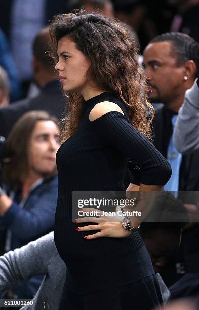 Noura El Shwekh, pregnant with Jo-Wilfried Tsonga of France attends his second round victory against Albert Ramos-Vinolas of Spain during the BNP...