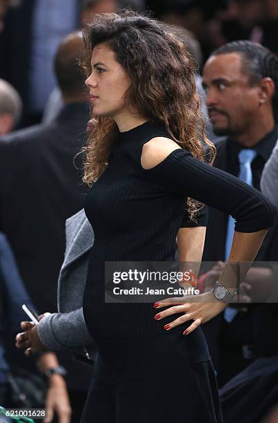 Noura El Shwekh, pregnant with Jo-Wilfried Tsonga of France attends his second round victory against Albert Ramos-Vinolas of Spain during the BNP...