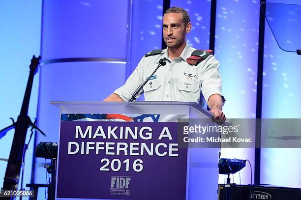 Master Sgt. Omri Michaeli speaks onstage during the Friends Of The Israel Defense Forces Western Region Gala at The Beverly Hilton Hotel on November...
