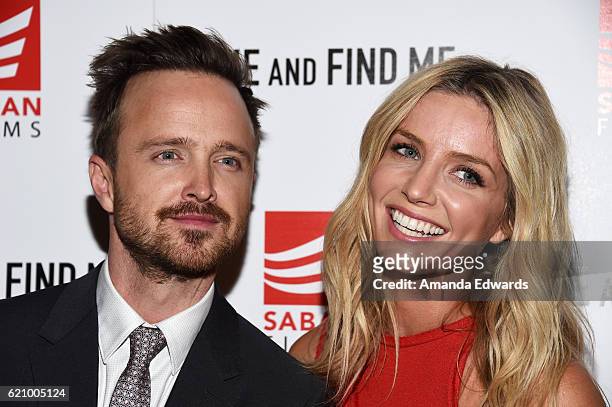 Actor Aaron Paul and actress Annabelle Wallis arrive at the premiere of Saban Films' "Come and Find Me" at the Pacific Theatre at The Grove on...