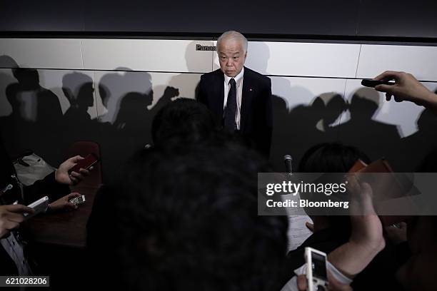 Yoichiro Nomura, chief financial officer of Takata Corp., speaks to members of the media after a news conference at the Tokyo Stock Exchange in...
