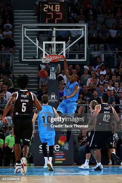 Akil Mitchell of the Breakers dunks the ball during the round five NBL match between Melbourne United and the New Zealand Breakers on November 4,...