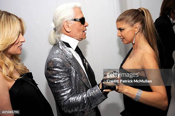 Rebekah McCabe, Karl Lagerfeld and Fergie attend THE COSTUME INSTITUTE GALA: "SUPERHEROES" with honorary chair GIORGIO ARMANI at The Metropolitan...