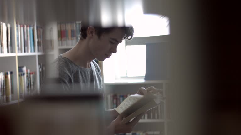Book Library Viode 9,389 Student Reading Library Stock Videos, Footage, & 4K Video Clips ...