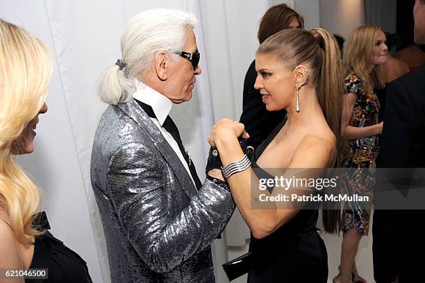 Rebekah McCabe, Karl Lagerfeld and Fergie attend THE COSTUME INSTITUTE GALA: "SUPERHEROES" with honorary chair GIORGIO ARMANI at The Metropolitan...