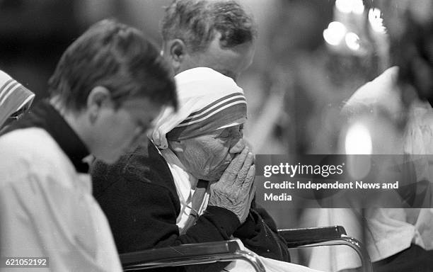 Mother Teresa of Calcutta prays during a special afternoon of prayer at Sligo Cathedral, where she also recieved the Freedom of the City, .