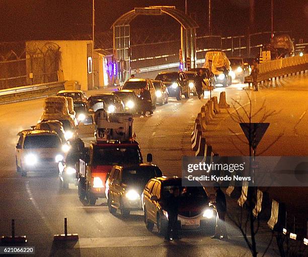 South Korea - South Korean vehicles arrive at the inter-Korean transit office in Paju, South Korea, returning from an inter-Korean industrial complex...