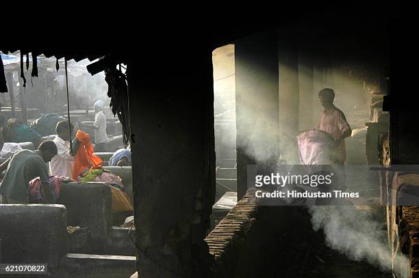 Washermen working at Dhobi Ghat at Mahalaxmi.